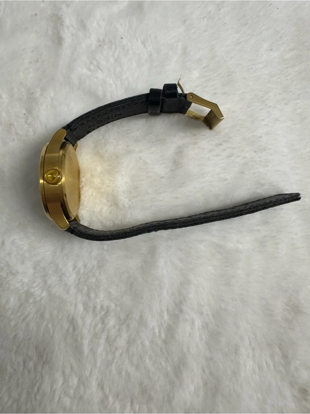 Nixon men’s gold